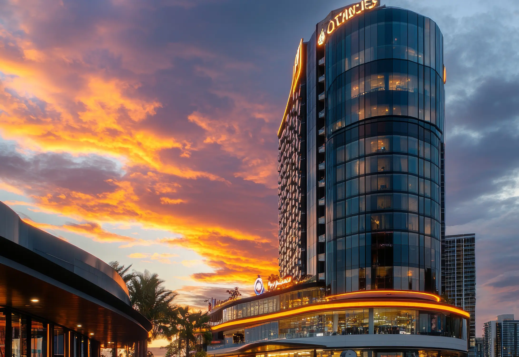 building-with-word-hotel-it-sunset-background